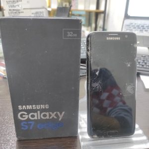 گوشی سامسونگ گلکسی Galaxy S7 Edge نقره ای مشکی رام 4 حافظه 32 گیگ (نیازمند تعمیر جهت استفاده از قطعات)